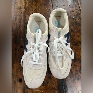 Beige Sneakers with Blue Accents